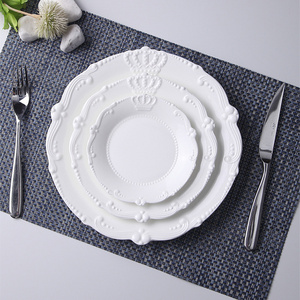 Elegant embossed design ceramic white plates crown shape dinner plate set for events