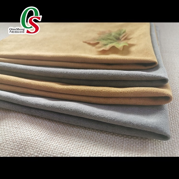 Wholesale manufacturers weft Knitted premium 100% polyester faux micro suede home textile sofa fabric for bags  shoes curtain