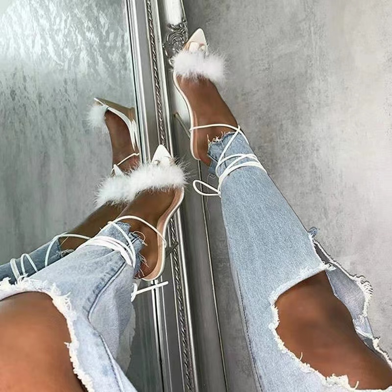 Spring and summer new women's shoes Europe and the United States feather strap transparent crystal high heel thin pointed sandal