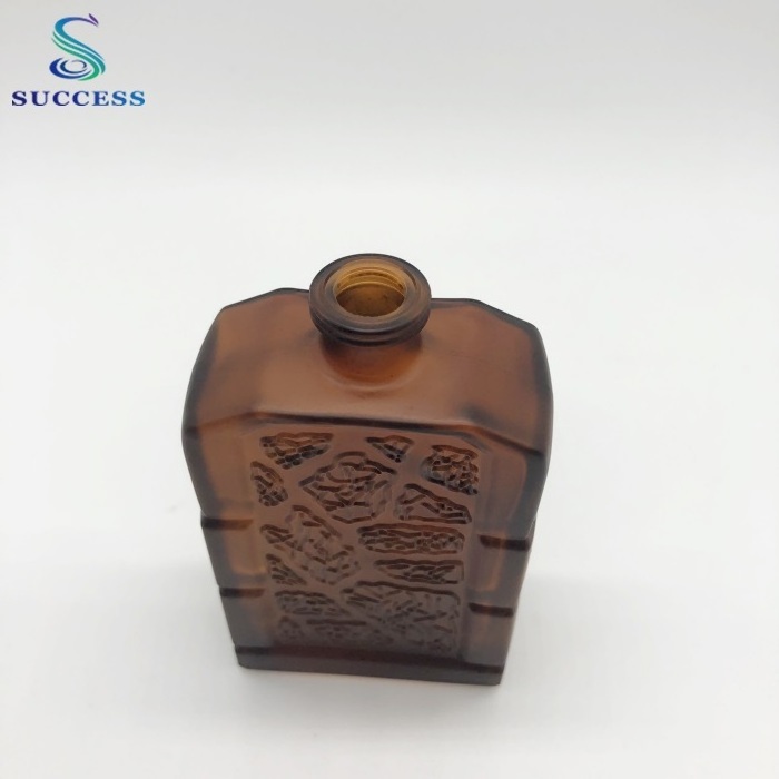 square brown 60ml glass perfume bottle with decorative pattern