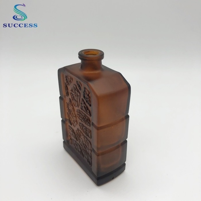 square brown 60ml glass perfume bottle with decorative pattern