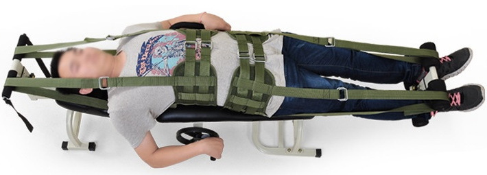 Best Selling Manual Multifunction Orthopedic Spine Traction Bed for Cervical and Lumbar Treatment with Portable Adjustable Table