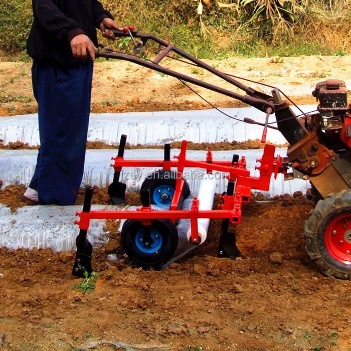 Agricultural Hand tractor matching plastic mulch applicator laying machine/manual gasoline driven thin film covering equipment