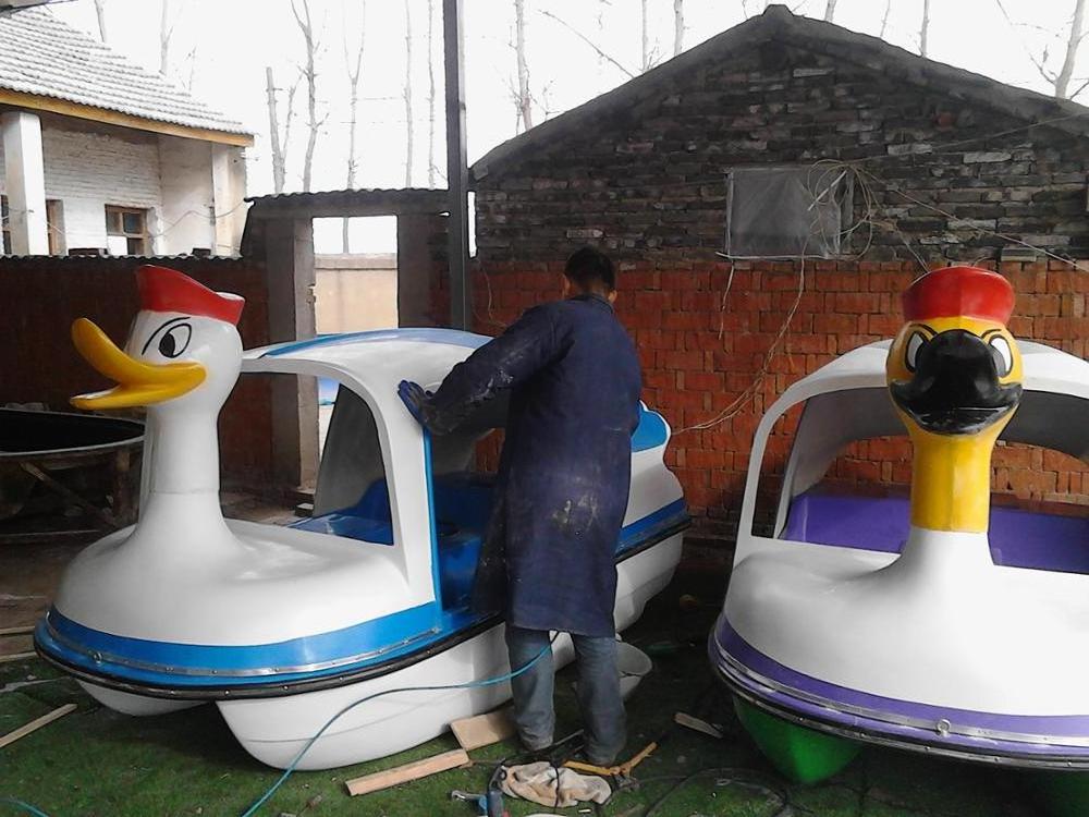 Famous yellow duck shape amusement equipment adult cartoon animals pedal boat for sale