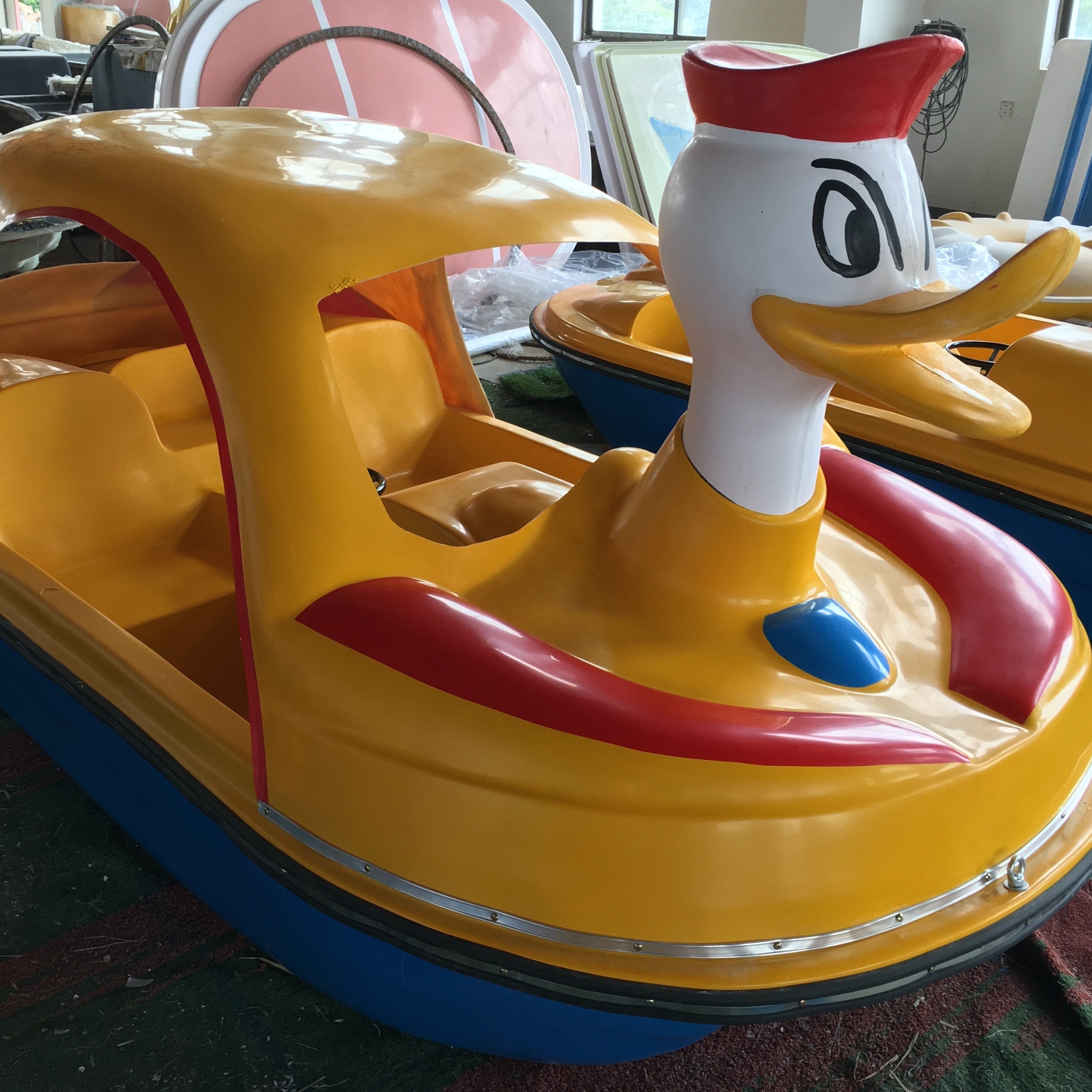 Famous yellow duck shape amusement equipment adult cartoon animals pedal boat for sale