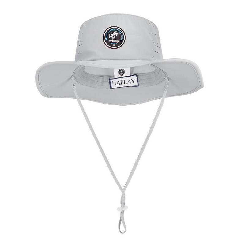 Wholesale wide brim boonie fishing sun hat rubber patch logo custom waterproof laser cut hole bucket hat with string