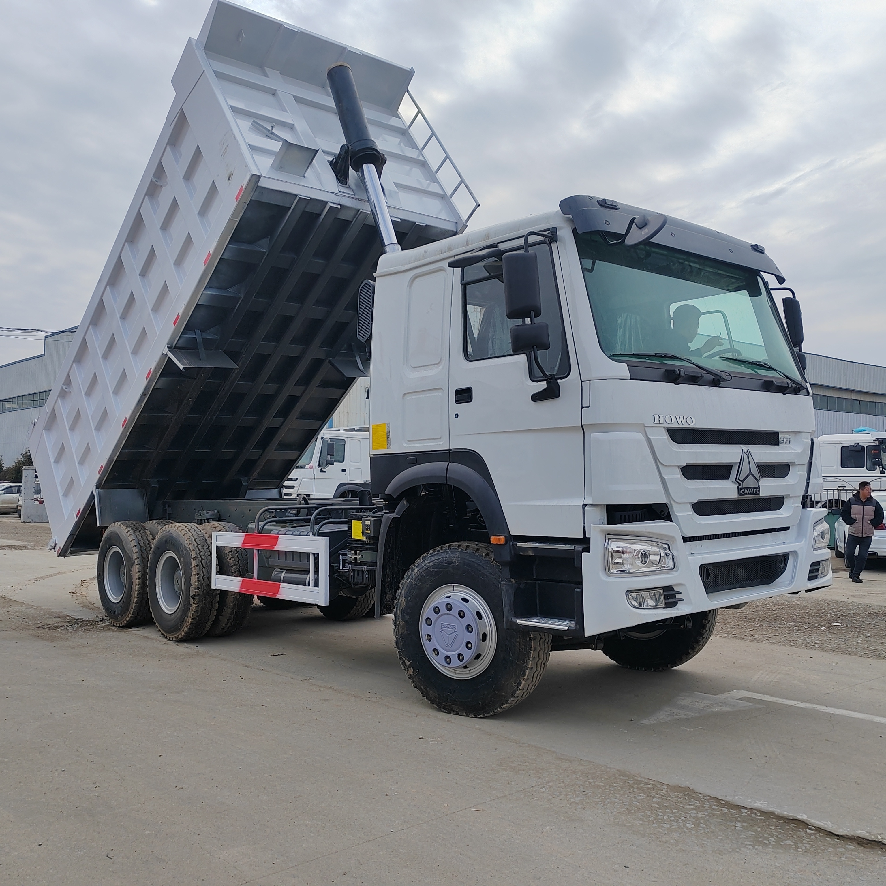 China Famous Brand HoWo Sinotruk Dumping Trucks Cheap Price Hot Selling 6x4 10 Tires 400HP Dump Truck Transporting In Afirca