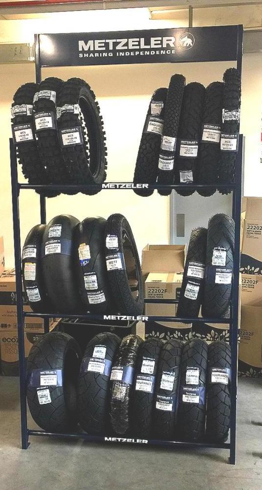 Adjustable tire display rack stand