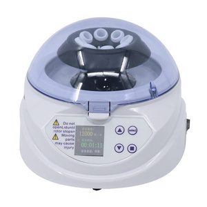 Small laboratory centrifuge machine for for microfiltration and quick spin-downs