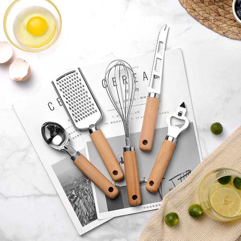 Wholesale kitchen gadgets stainless steel egg beater whisk pizza cutter slicer garlic crusher cheese grater