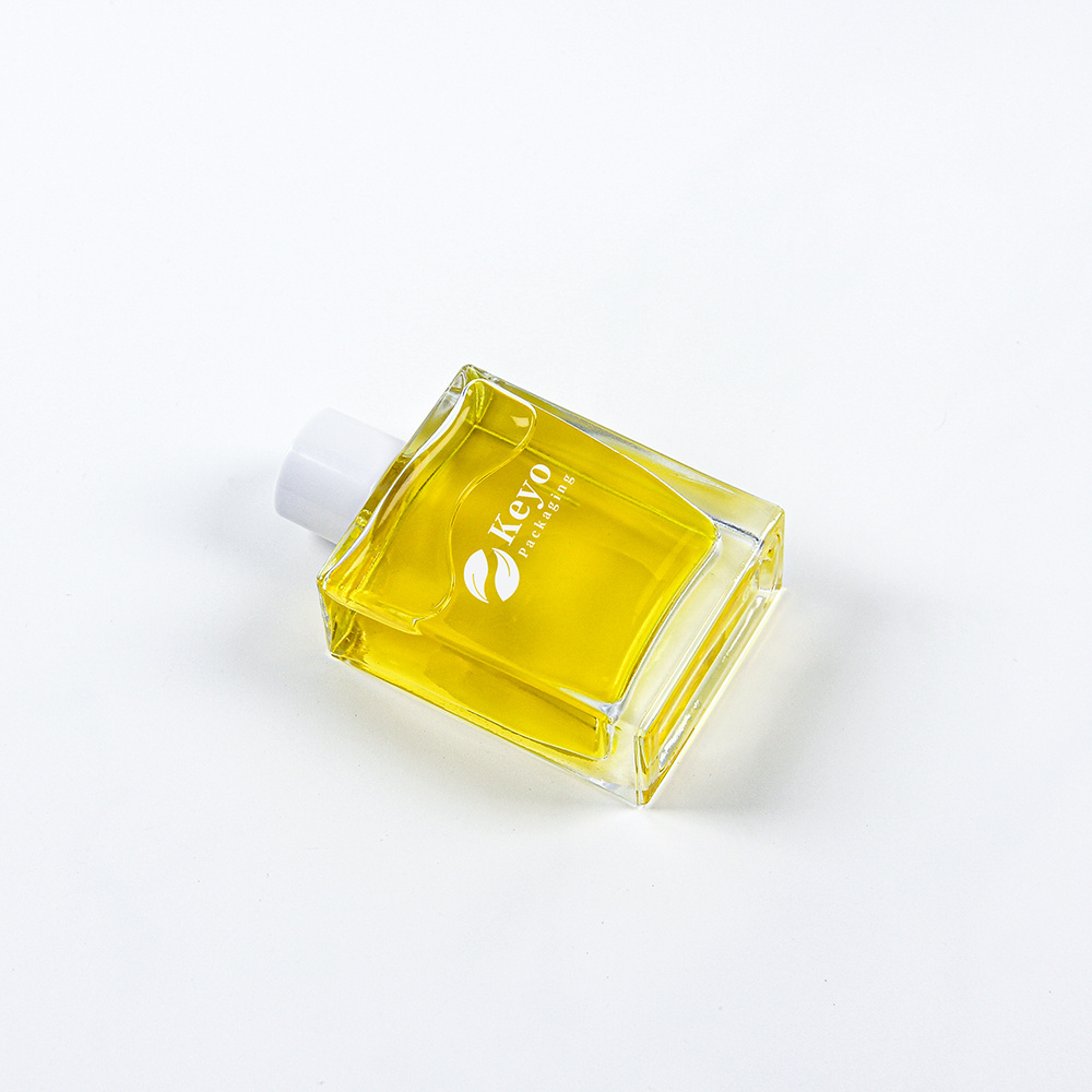 Hot sale Square rectangular 30 50Ml 100Ml Empty clear hair Oil face oil skincare Glass Bottle with white screw cap