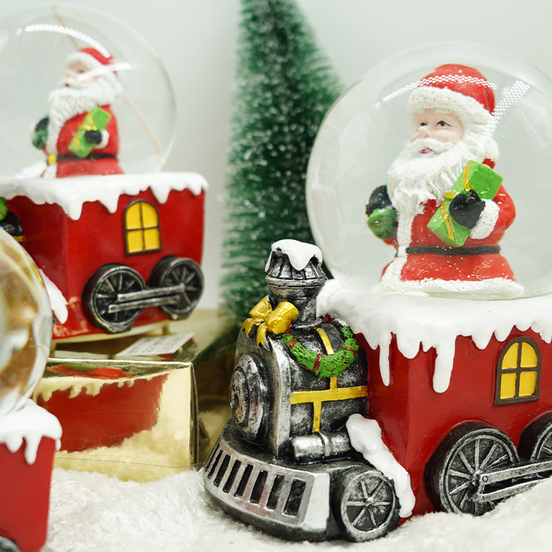 Luxury Resin Crafts Christmas Decoration Small Train Gift Santa Claus Style Empty Lighting Snowballs With Music