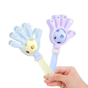 Wholesale plastic cheap musical baby rattle toy shaker rattle football bell in hand clapper plastic hand clappers