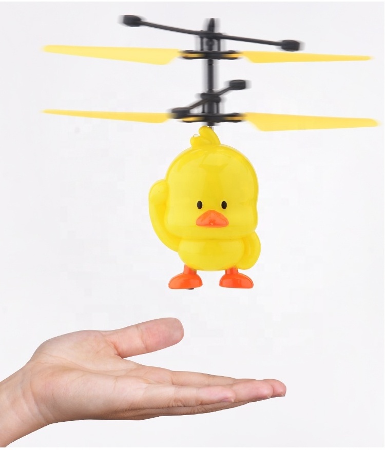 Best Christmas gift Cheapest new flying hand induction duck toy with lighting flying new ufo  flying lighting toys