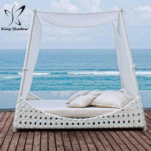 Home patio beach thick rattan material pyamidal cocoon shaped chair outdoor wicker daybed on sale