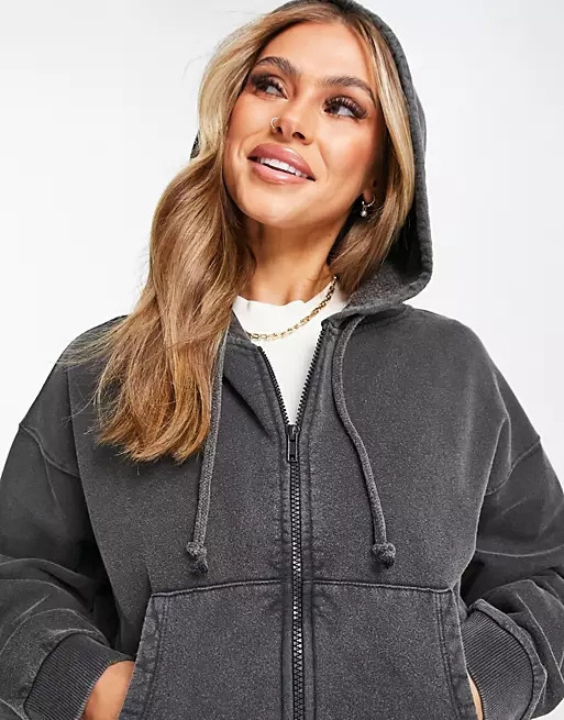 KY 100% Cotton washed black Drawstring hood Zip fastening Side pockets Ribbed trims Oversized fit hoodie