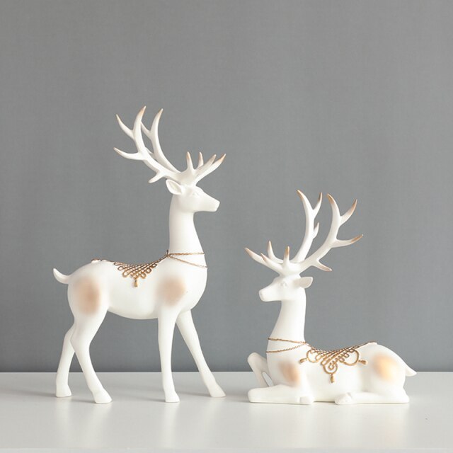 Laying white ceramic christmas reindeer figurine statue for decor