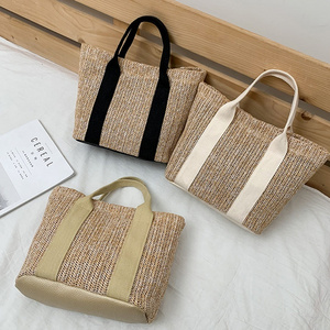 2023 New Fashion Women Handmade Woven Tote Handbags Weaving Wholesale Fashion Female Grass Straw Beach Bags