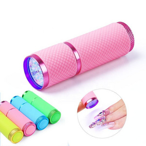 Wholesale Rubber Purple Light AAA Battery Nail Polish Dryer UV Lamp fast Drying Mini 9led Flashlight For Curing Nail Gel