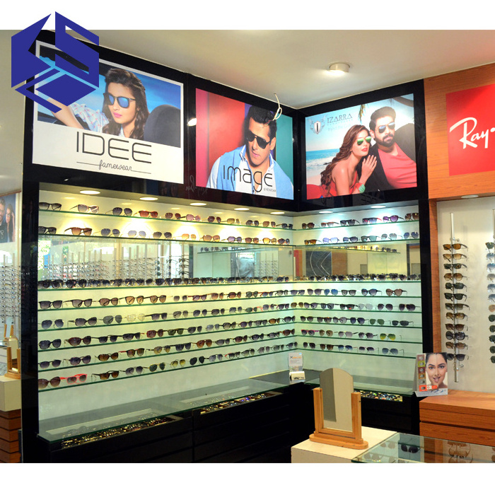 High quality sunglasses shop furniture design wall mounted wooden glasses display stand used optical display cabinets