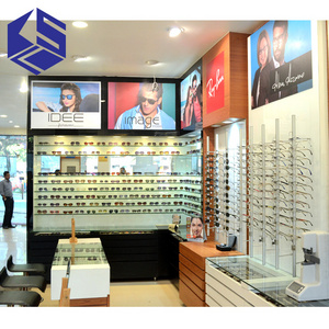 High quality sunglasses shop furniture design wall mounted wooden glasses display stand used optical display cabinets