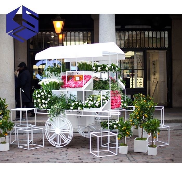 Favorable price on discounts outdoor metal flower cart wheels decorative cart white gift cart for wholesale