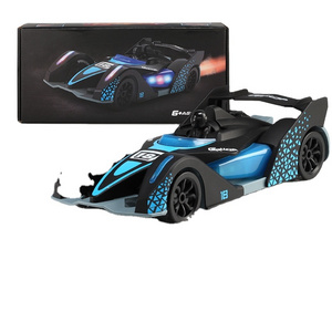 Wholesale Spray Drift Racing High Speed Music Light 2.4Ghz Remote Control Car RC Electric Toys Cars for Kids Gua 50m