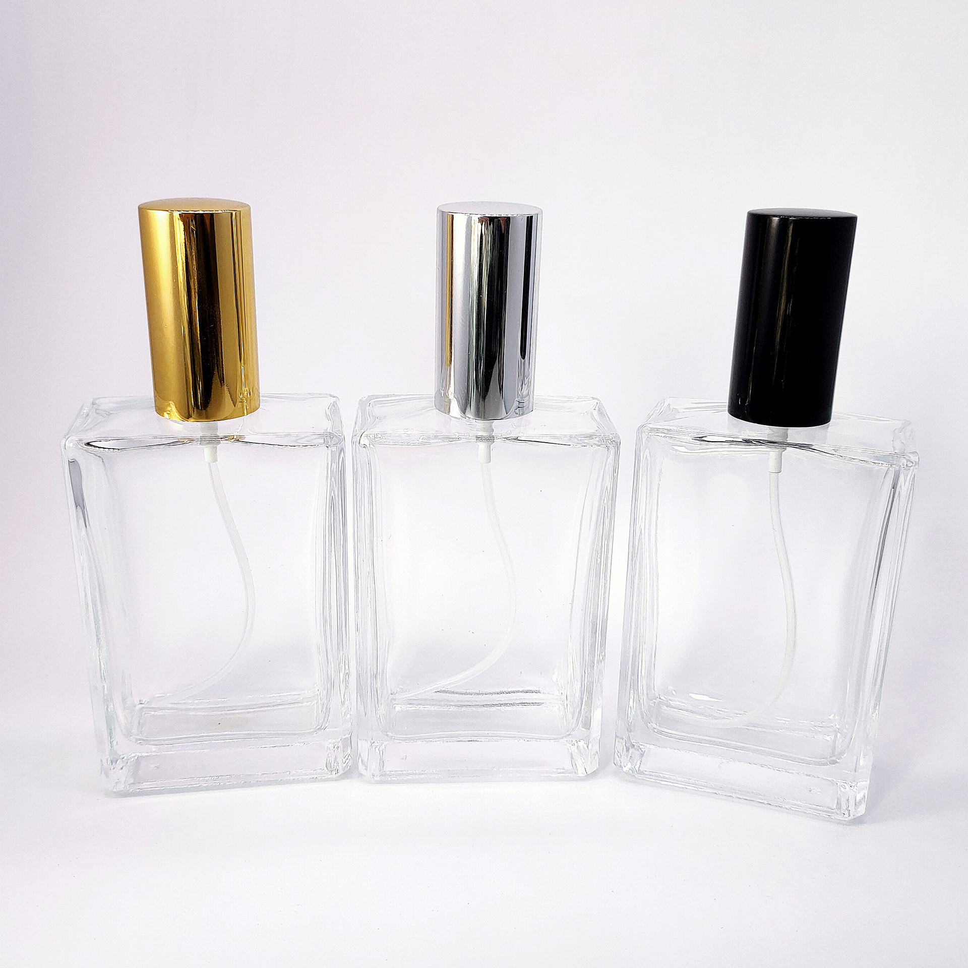 Wholesale Refillable Square Clear Custom Luxury Gold Spray 100ml Empty Perfume Glass Bottle