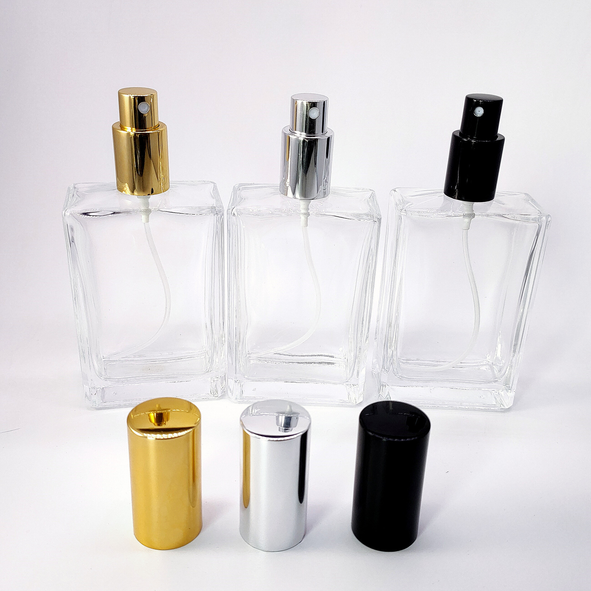 Wholesale Refillable Square Clear Custom Luxury Gold Spray 100ml Empty Perfume Glass Bottle