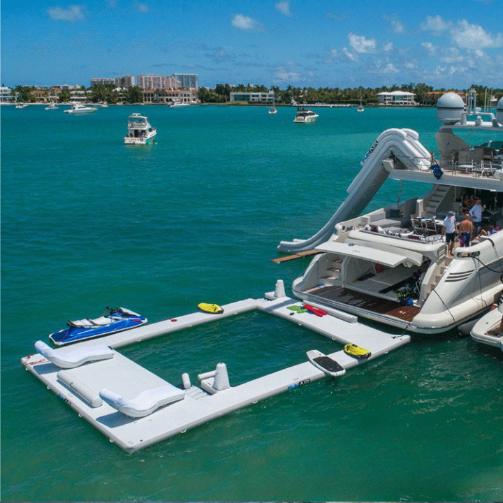 Hot Sale Summer Inflatable floating platform dock yacht floating swimming pool with safety net with air pump for sale