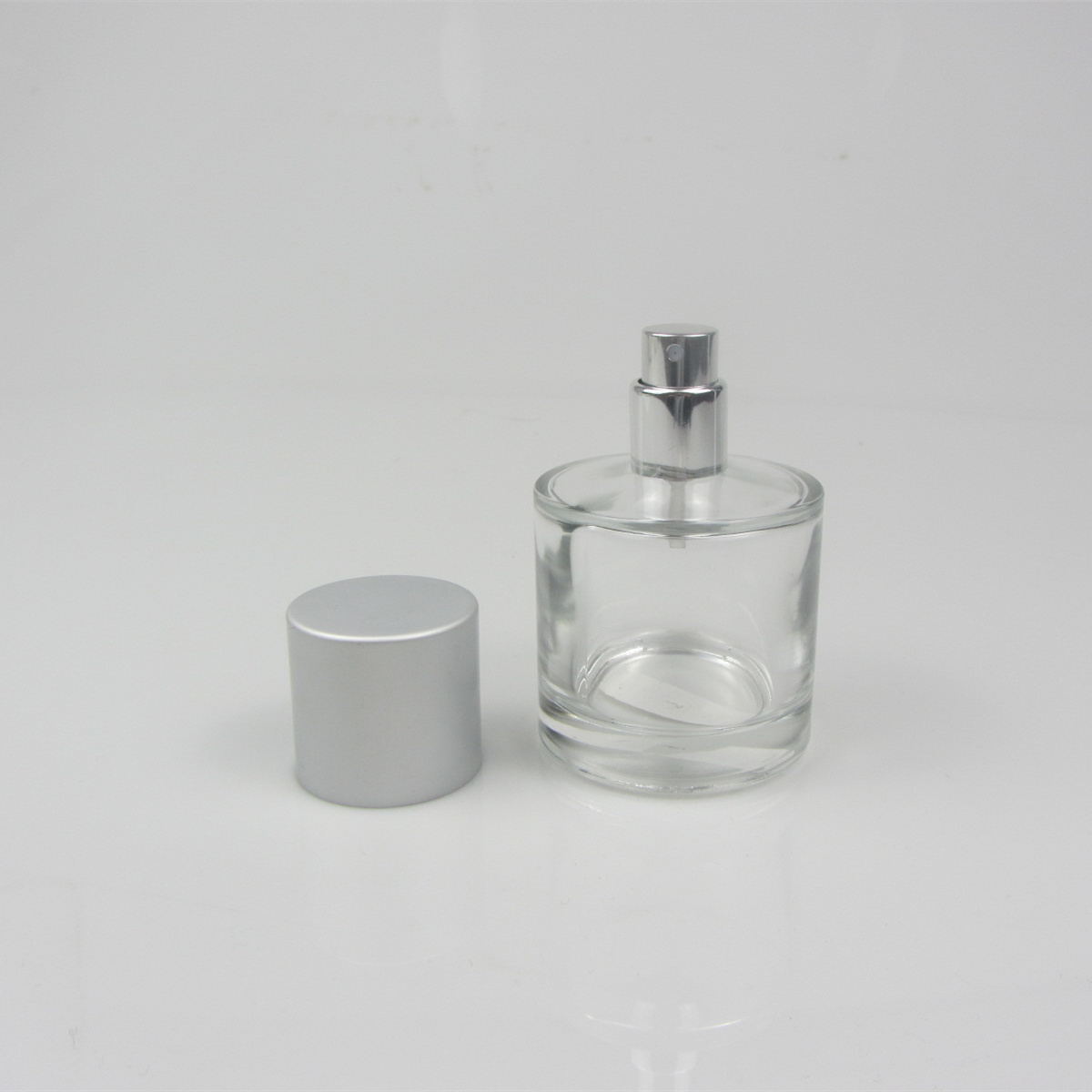 Clear Round Iridescent Clear Glass Spray Perfume Empty Colored Glass Bottle