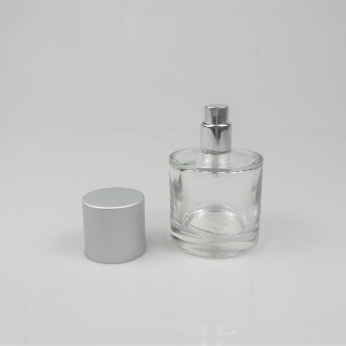 Clear Round Iridescent Clear Glass Spray Perfume Empty Colored Glass Bottle