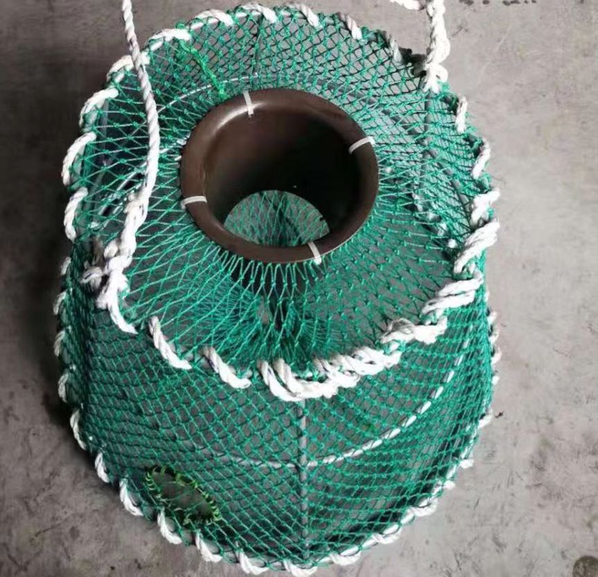 Marine fresh catch fishing gear commercial fishery  netting  web King crab trap, Tanner and Dungeness crab trap.