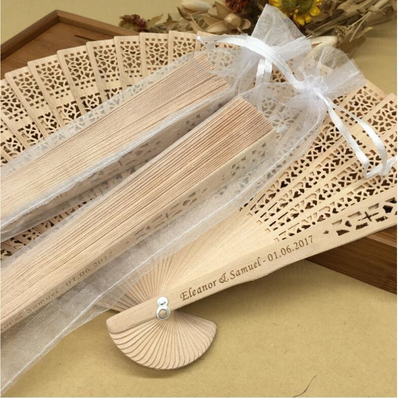 Custom logo Best Gift Chinese carved folding fragrance wood hand fan Hotel wedding fan