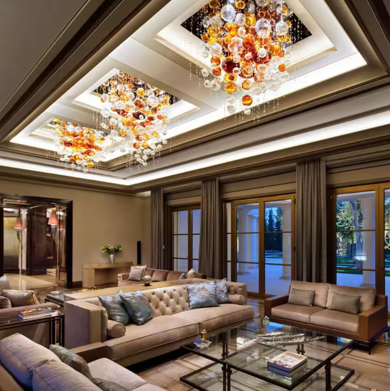 Custom Luxury Villa Dining Room Glass Bubble stairwell entryway foyer large empire chandelier lights