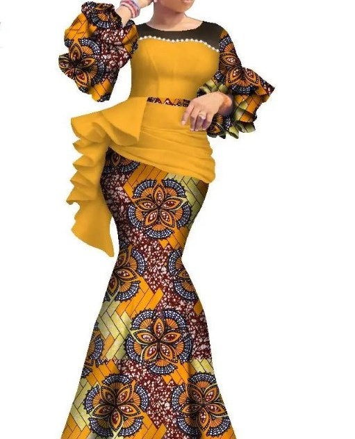 Newly designed African dress. traditional Nigerian wedding dress.Bazinriche pearl dress