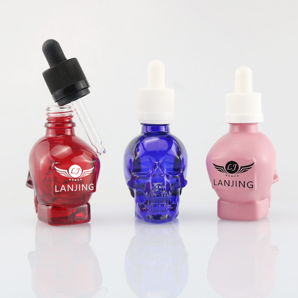 perfume 30ml 60ml 120ml skin care packaging skull head shape glass skull 1oz glass beard oil  dropper bottle for Wine container