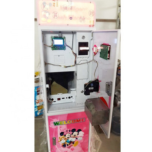 Self service money exchanger with coin washer dryer machines