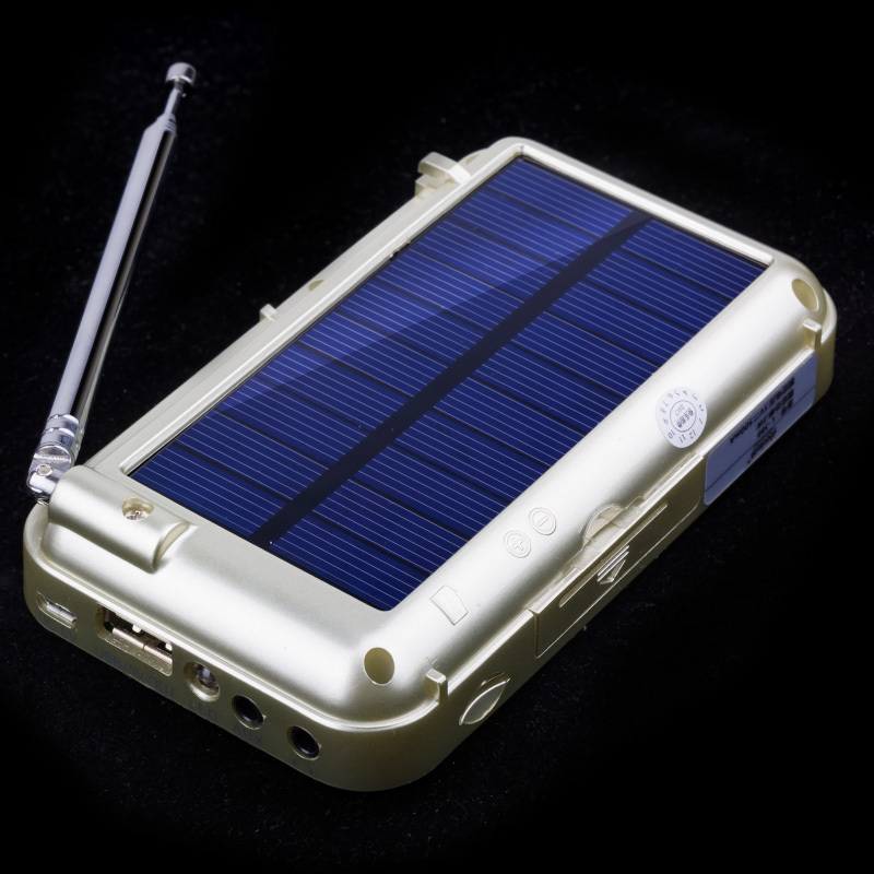 LCJ L-388 cheap portable solar panel charging solar powered FM radio with LED flashlight light and mini speaker