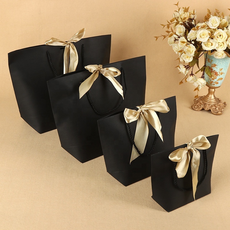 High quality factory wholesale black kraft paper gift shopping bags with golden ribbon bow