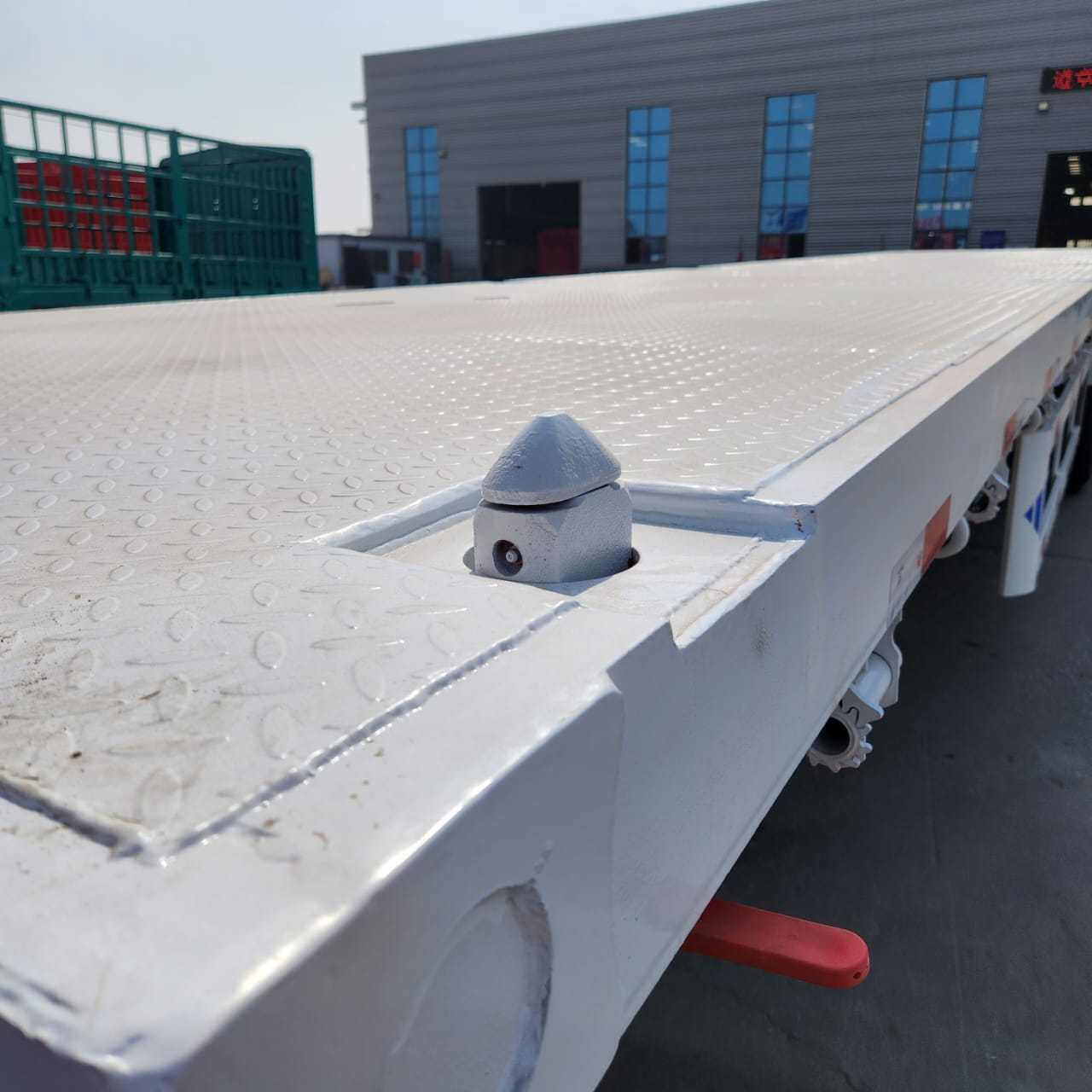 2023 New Style Tri Axle Flatbed Semi Trailer Transport Container Port Flatbed Semi Trailer Heavy Goods Cargo Trailers for Sale