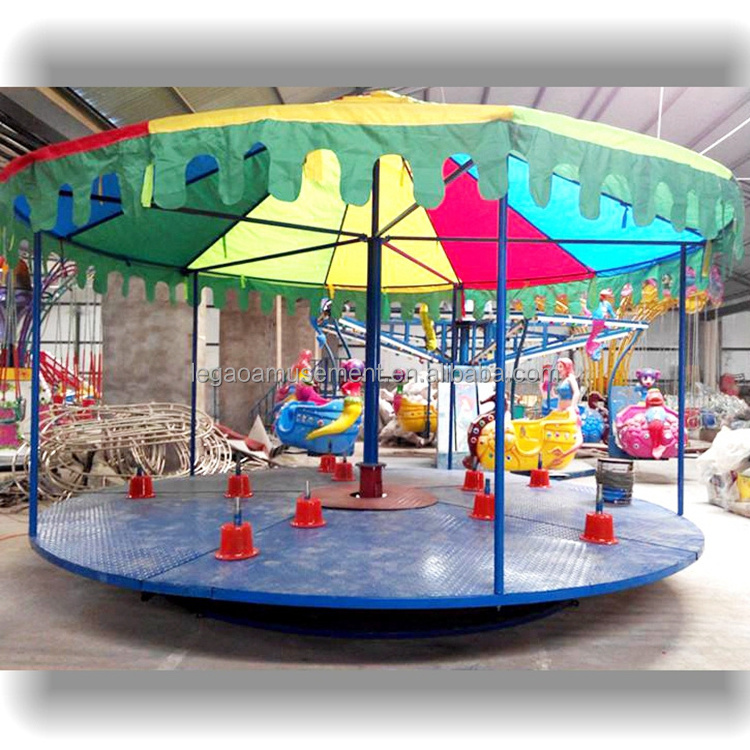 kids outside game amusement park outdoor merry go round playground equipment