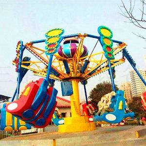 Crazy high-altitude shooting of spinning swings in large amusement parks