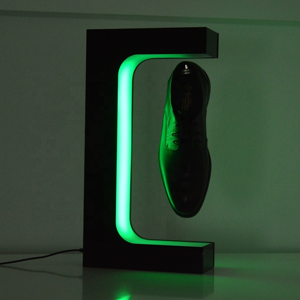 Magnetic levitating shoe display rack with multicolor lighting