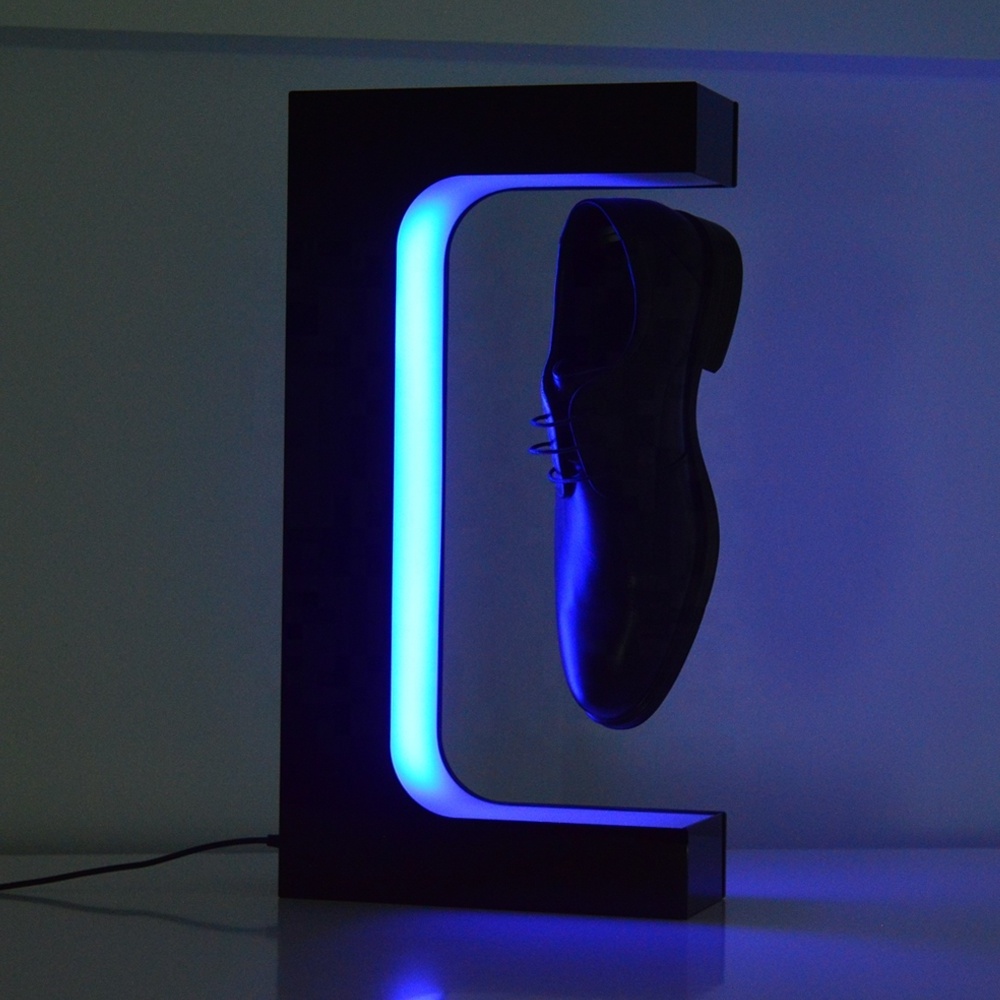 Magnetic levitating shoe display rack with multicolor lighting