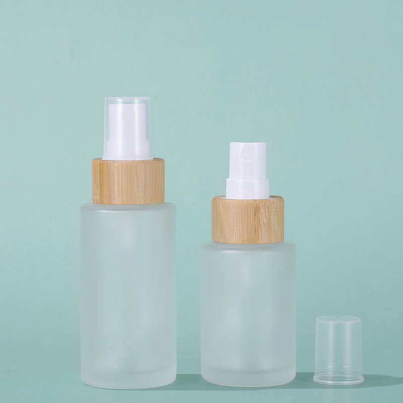 Customized 4oz Frosted Glass Bottles With Bamboo Spray Cap Fine Mist Sprayer Pump 30ml 50ml 100ml Empty Cosmetic Packaging