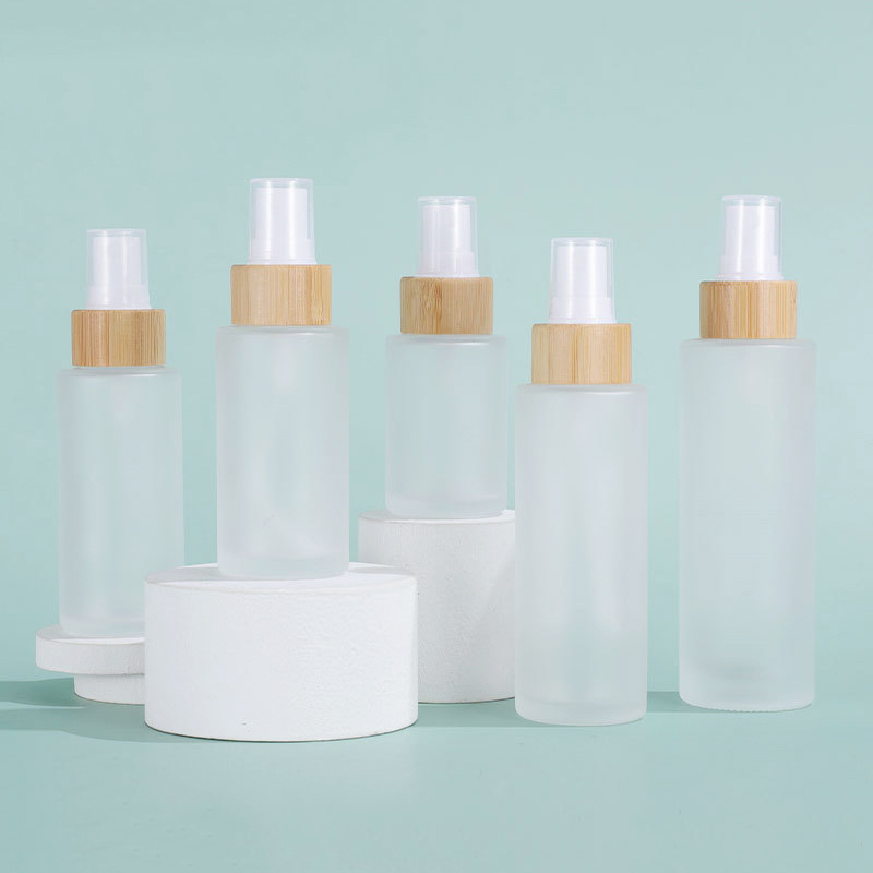 Customized 4oz Frosted Glass Bottles With Bamboo Spray Cap Fine Mist Sprayer Pump 30ml 50ml 100ml Empty Cosmetic Packaging