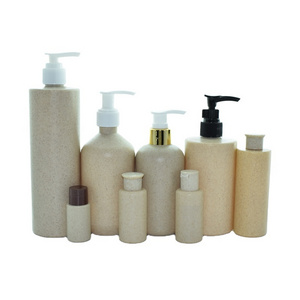 Biodegradable Cosmetic Container 100ml Wheat Straw PLA Round Shampoo Bottle Factory Supplier 100ml 250ml 300ml 500ml with Black