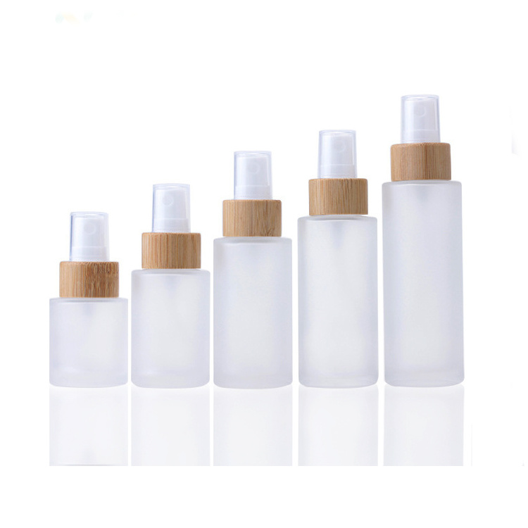 Customized 4oz Frosted Glass Bottles With Bamboo Spray Cap Fine Mist Sprayer Pump 30ml 50ml 100ml Empty Cosmetic Packaging