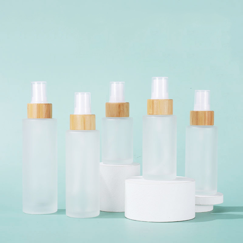 Customized 4oz Frosted Glass Bottles With Bamboo Spray Cap Fine Mist Sprayer Pump 30ml 50ml 100ml Empty Cosmetic Packaging